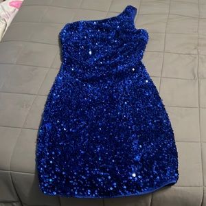 Beautiful blue sequin dress very soft not scratchy and never worn